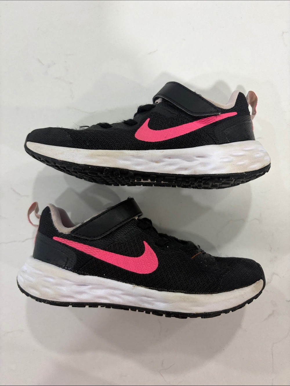 Nike Kids Black Sneakers with Pink Swoosh